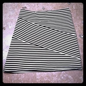 Wet Seal flattering skirt - very comfy too! Size XL